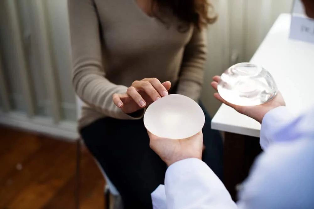 Confident woman considering breast lift augmentation surgery in the Dallas Fort Worth area