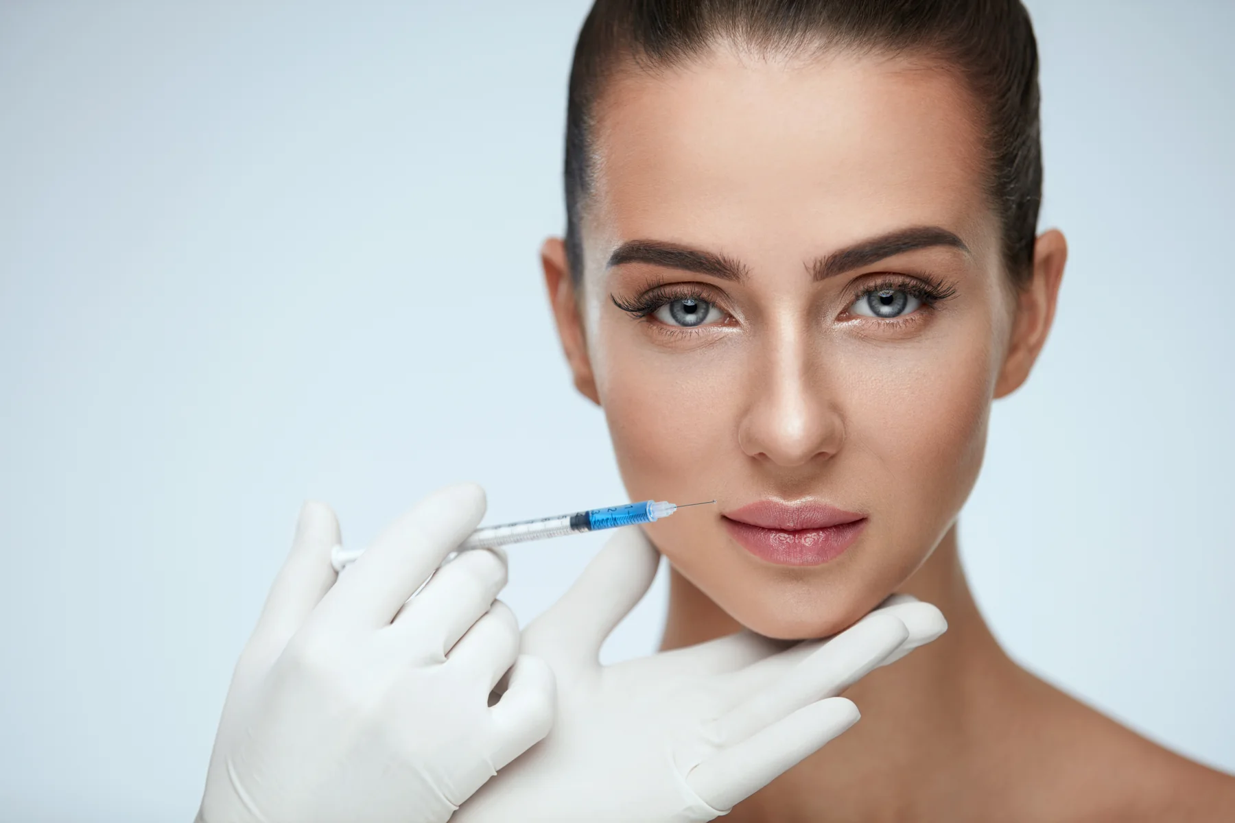 sculptra injectable on womans face